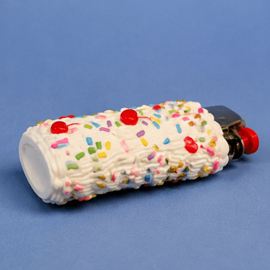 The Cake Lighter lying on its side